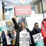 Unions and students picketing on Kennedy Boulevard.