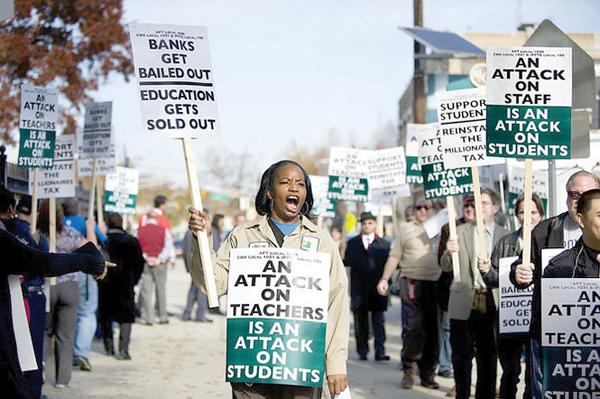 Unions and students picketing on Kennedy Boulevard.