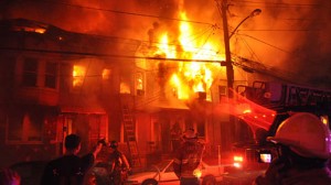 APTOPIX Row Homes Burn