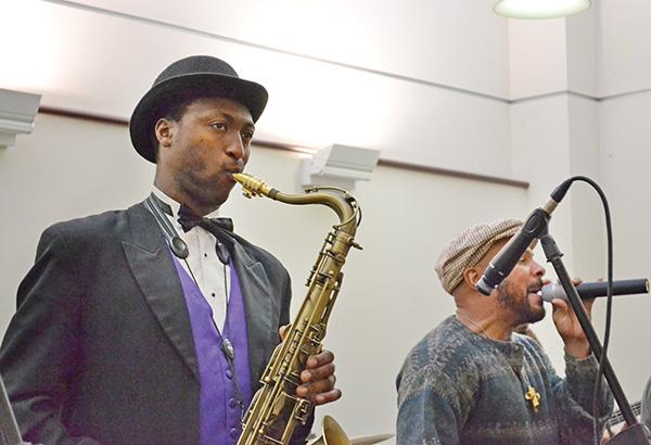 Close up of the Brown Rice Family saxophone player as he enters his solo. *Photo by Antonio Talamo